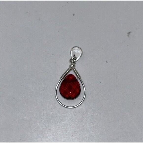 Unbranded Jewelry - Silvertone Pendant With A Red Stone Suspended In A Teardrop (no chain) Elegant
